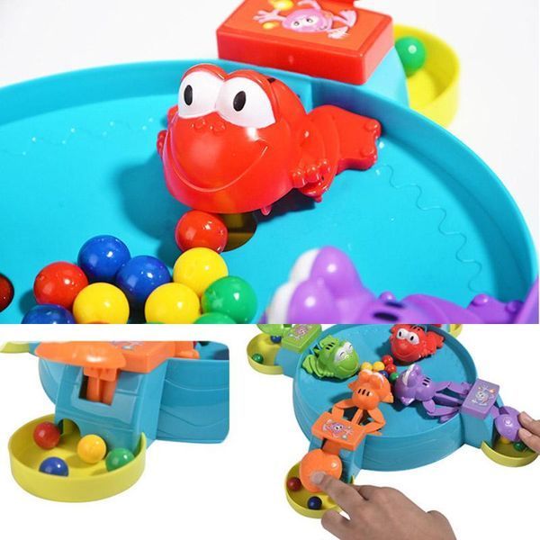 Настільна інтерактивна гра Ummi 707-35 Feeding Frog Game 79508 фото